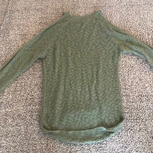 green shoulder sweater